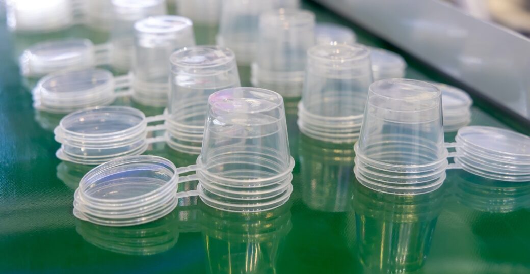 Food-grade plastic cups illustrating closed-loop recycling.